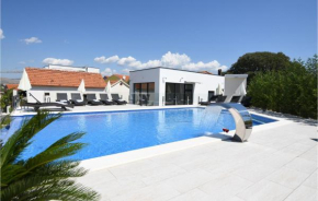 Stunning home in Okrug Gornji with Outdoor swimming pool, Heated swimming pool and 2 Bedrooms